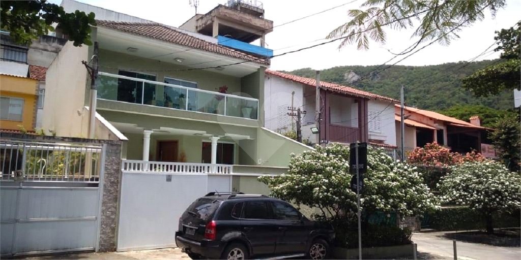 Casa à venda com 4 quartos, 260m² - Foto 2